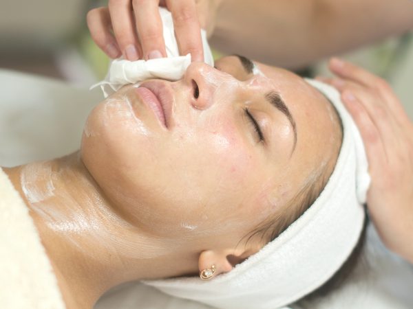 Facial cleansing at skin care spa
